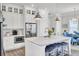 Bright kitchen with a large island, white cabinets, and stainless steel appliances, great for entertaining at 2928 Tranquility Rd, Mount Pleasant, SC 29466