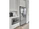 Kitchen featuring stainless steel appliances including fridge, microwave, and coffee maker at 2928 Tranquility Rd, Mount Pleasant, SC 29466