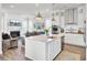 Open-concept kitchen and living area featuring a large island and stainless steel appliances at 2928 Tranquility Rd, Mount Pleasant, SC 29466