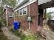 Side exterior of the brick house and the yard at 3 Woodall Ct, Charleston, SC 29403