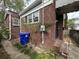 Side exterior of the brick house and the yard at 3 Woodall Ct, Charleston, SC 29403