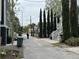 Charming street view with diverse architectural styles and lush greenery enhancing neighborhood appeal at 3 Woodall Ct, Charleston, SC 29403
