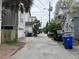 Street view of homes, utility poles, and parked vehicles at 3 Woodall Ct, Charleston, SC 29403