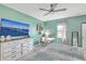 Bright bedroom featuring a large window, dresser, and tranquil decor, designed for relaxation and rest at 302 Fox Gap Rd, Summerville, SC 29486
