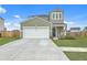 Charming two-story home with a well-manicured lawn and a welcoming front porch at 302 Fox Gap Rd, Summerville, SC 29486