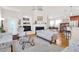 Comfortable living room with a fireplace, floral sofas, and hardwood floors at 3030 Baltimore St, Charleston, SC 29492