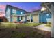 Inviting backyard with a fire pit, comfortable seating, and well-manicured lawn perfect for entertaining at 310 Ripple Park Dr, Summerville, SC 29486