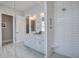 Bright bathroom with white cabinets, a glass shower, and modern fixtures offer a clean and stylish design at 310 Ripple Park Dr, Summerville, SC 29486