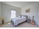 Bright bedroom with white walls, a soft bed, and decor creating a cozy, inviting space at 310 Ripple Park Dr, Summerville, SC 29486