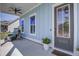 Cozy front porch featuring comfortable seating, ideal for relaxing outdoors at 310 Ripple Park Dr, Summerville, SC 29486