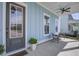 Charming covered porch with elegant seating, and a welcoming entrance at 310 Ripple Park Dr, Summerville, SC 29486