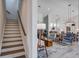 Inviting living room featuring an open floor plan, hardwood floors, and ample natural light at 310 Ripple Park Dr, Summerville, SC 29486