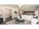 Comfortable living room featuring an open floor plan, wood floors, and lots of natural light at 325 Calm Water Way, Summerville, SC 29486