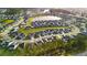 Aerial shot of housing development featuring well-maintained lawns and proximity to serene pond at 332 Long Pier St, Summerville, SC 29486
