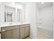 Bathroom with double vanity, white countertop, tile floor, and shower at 332 Long Pier St, Summerville, SC 29486