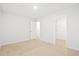 Bright bedroom with walk-in closet, neutral carpet, and fresh paint at 332 Long Pier St, Summerville, SC 29486