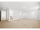 Neutral bonus room with light carpet, white walls, and two doorways at 332 Long Pier St, Summerville, SC 29486