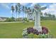 West Lake community sign with crossed oars surrounded by lush landscaping on a sunny day at 332 Long Pier St, Summerville, SC 29486