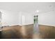 Spacious living area with hardwood floors and sliding glass doors leading to an outdoor space at 332 Long Pier St, Summerville, SC 29486