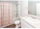 Well-lit bathroom with white vanity, toilet, and shower-tub combo with chrome fixtures at 369 Spruce Ivy St, Moncks Corner, SC 29461