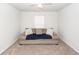 This bright bedroom includes a loveseat for comfortable seating at 369 Spruce Ivy St, Moncks Corner, SC 29461