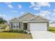 Charming brick home with a two-car garage and well-maintained landscaping at 369 Spruce Ivy St, Moncks Corner, SC 29461