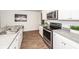 Contemporary kitchen with stainless steel appliances and ample counter space at 369 Spruce Ivy St, Moncks Corner, SC 29461