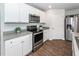 Modern kitchen featuring stainless steel appliances and white cabinetry at 369 Spruce Ivy St, Moncks Corner, SC 29461