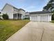 Spacious backyard features a detached two-car garage and back porch at 3700 Maidstone Dr, Mount Pleasant, SC 29466