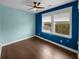 Bright bedroom features hardwood floors, two-tone walls and a lighted ceiling fan at 3700 Maidstone Dr, Mount Pleasant, SC 29466