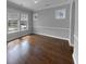 Dining room featuring hardwood flooring, neutral walls, white trim, and natural light at 3700 Maidstone Dr, Mount Pleasant, SC 29466