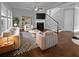 Bright living room features a fireplace, stairs, neutral colors, and stylish furniture at 3700 Maidstone Dr, Mount Pleasant, SC 29466