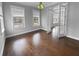 Versatile office space features hardwood floors and french doors leading to another room at 3700 Maidstone Dr, Mount Pleasant, SC 29466