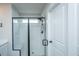 Modern bathroom featuring a glass-enclosed shower with white subway tiles at 4314 Cotton Flt Rd, Summerville, SC 29485