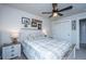Cozy bedroom showcasing a neutral color scheme, ceiling fan, and natural lighting at 4314 Cotton Flt Rd, Summerville, SC 29485