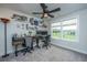 Bedroom with natural light, two desks, and a ceiling fan; ideal for a home office or study at 4314 Cotton Flt Rd, Summerville, SC 29485