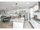 Open concept kitchen, dining room and living room featuring lots of natural light at 4314 Cotton Flt Rd, Summerville, SC 29485