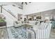 Spacious living room showcasing elegant furnishings, high ceilings, and a seamless flow at 4314 Cotton Flt Rd, Summerville, SC 29485