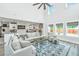 Open-concept living area with abundant natural light, comfortable seating, and modern decor at 4314 Cotton Flt Rd, Summerville, SC 29485