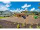 Fun community playground with a ship-themed structure, slide, and various ride-on toys for children at 4314 Cotton Flt Rd, Summerville, SC 29485