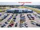 Aerial view of shopping center featuring a Publix grocery store with ample parking at 455 White Magnolia St, Moncks Corner, SC 29461