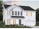 Charming two-story home with white siding, a black roof, and an attached two-car garage at 455 White Magnolia St, Moncks Corner, SC 29461
