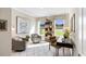 Inviting living room with comfortable seating, ample natural light, and stylish decor, perfect for relaxation and entertaining at 455 White Magnolia St, Moncks Corner, SC 29461
