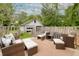 Inviting outdoor patio with plush seating, perfect for relaxing and entertaining at 4971 Edge Ave, Charleston, SC 29405