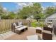 Outdoor patio features comfortable seating and tranquil garden views at 4971 Edge Ave, Charleston, SC 29405