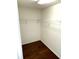 Walk-in closet featuring hardwood floors and wire shelving at 518 Antebellum Ln, Mount Pleasant, SC 29464