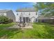 Spacious backyard with a patio, grilling area, and well-maintained lawn at 5224 Stonewall Dr, Summerville, SC 29485