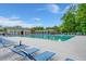 Large community pool with various seating and lounge chairs at 5224 Stonewall Dr, Summerville, SC 29485