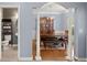 Elegant dining room showcasing a large wooden table, chandelier, and classic architectural details at 5224 Stonewall Dr, Summerville, SC 29485