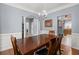 Traditional dining room with elegant wainscoting, light blue walls, and a chandelier above the dining table at 5224 Stonewall Dr, Summerville, SC 29485